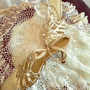 Dino style Gold metallic  sandals with 3 1/4 heel.